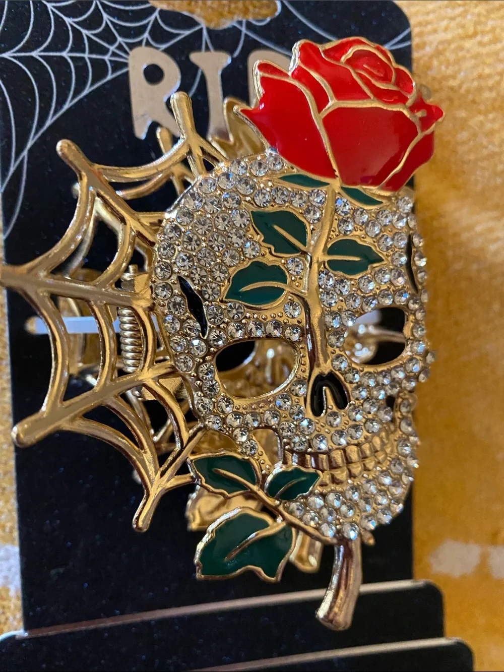 Nicole Miller Gold-Tone Crystal Skull Hair Pin with Red Rose and Green Leaves